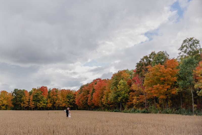 Bride and Groom in Fall Wedding Field in Prince Edward County